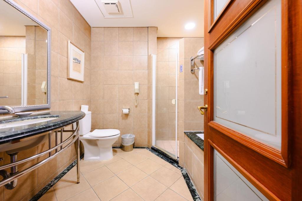 Koupelna v ubytování Wei-Yat Grand Hotel