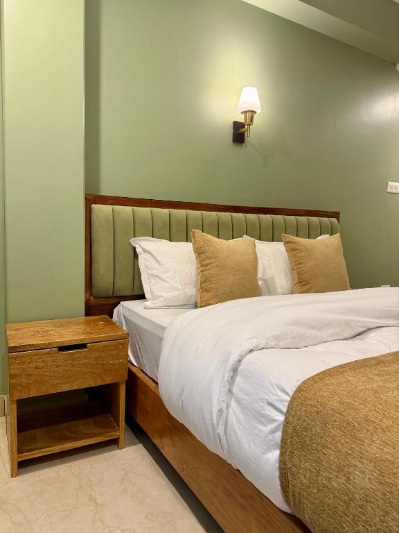 Postel nebo postele na pokoji v ubytování Paramount Apartment & Rooms