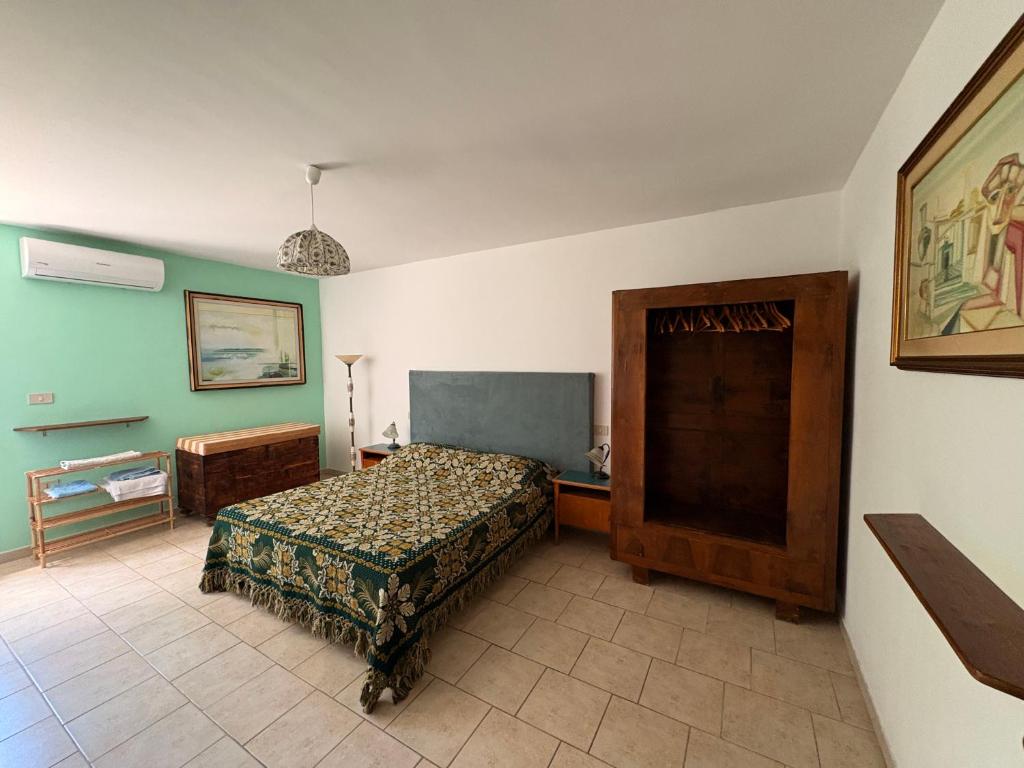 Postel nebo postele na pokoji v ubytování Casa in campagna a Rosciano