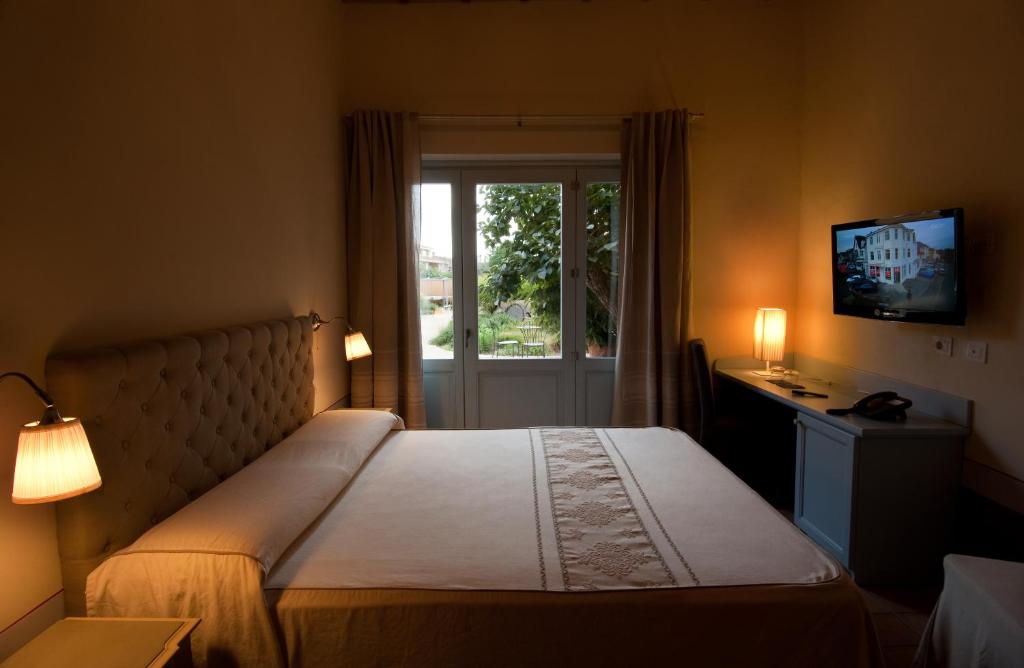 Postel nebo postele na pokoji v ubytování Aquae Sinis Albergo Diffuso