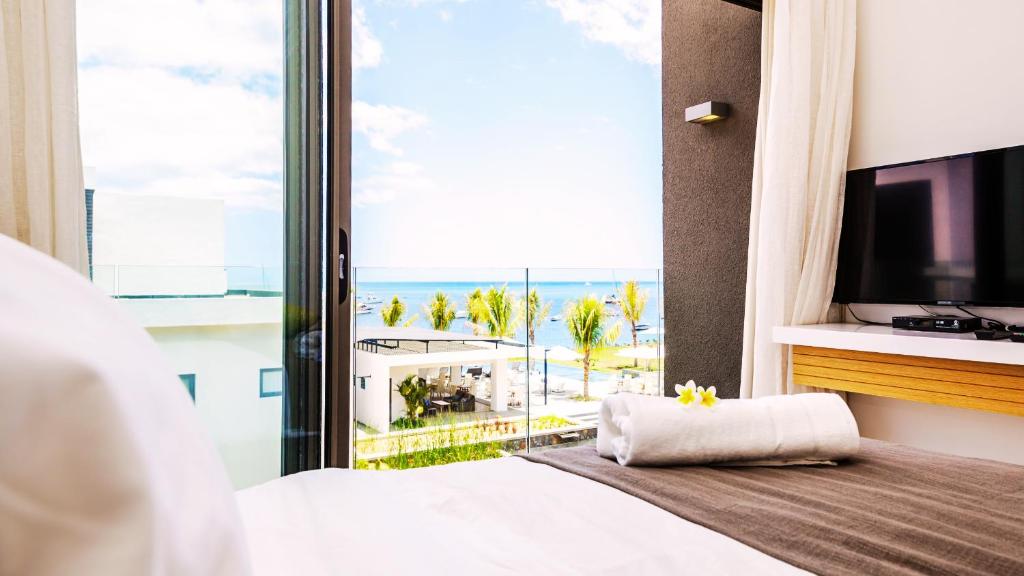 TV a/nebo společenská místnost v ubytování Latitude By Horizon Holidays