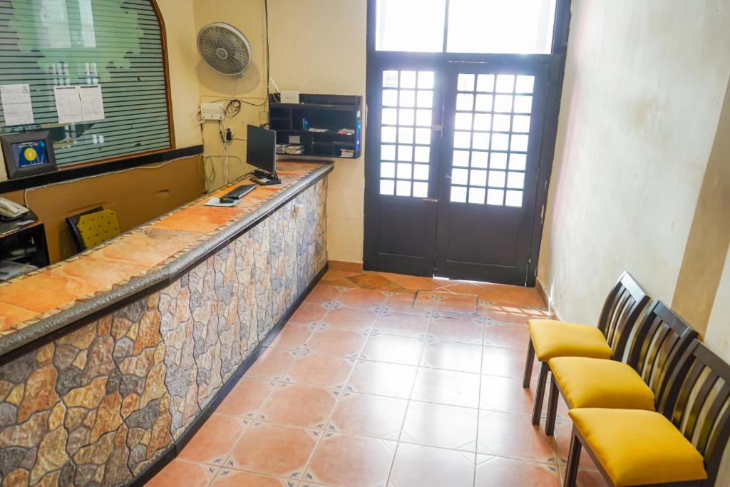 Kuchyň nebo kuchyňský kout v ubytování OYO Hotel Plaza Veracruz Centro Historico