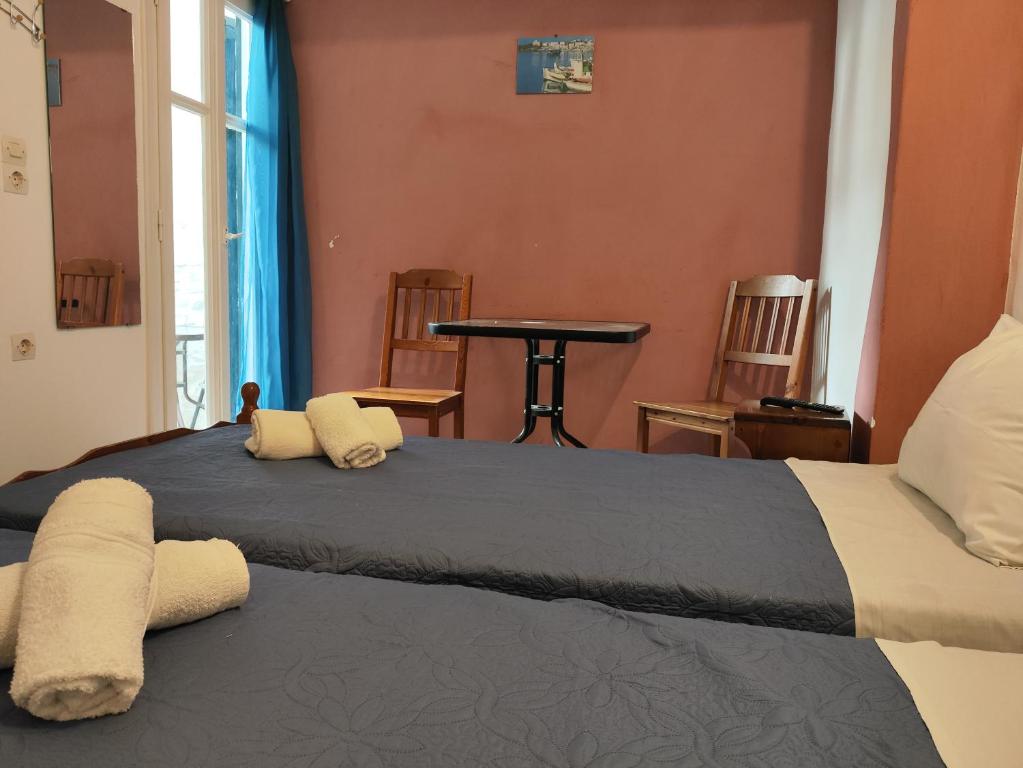Postel nebo postele na pokoji v ubytování Niki Rooms