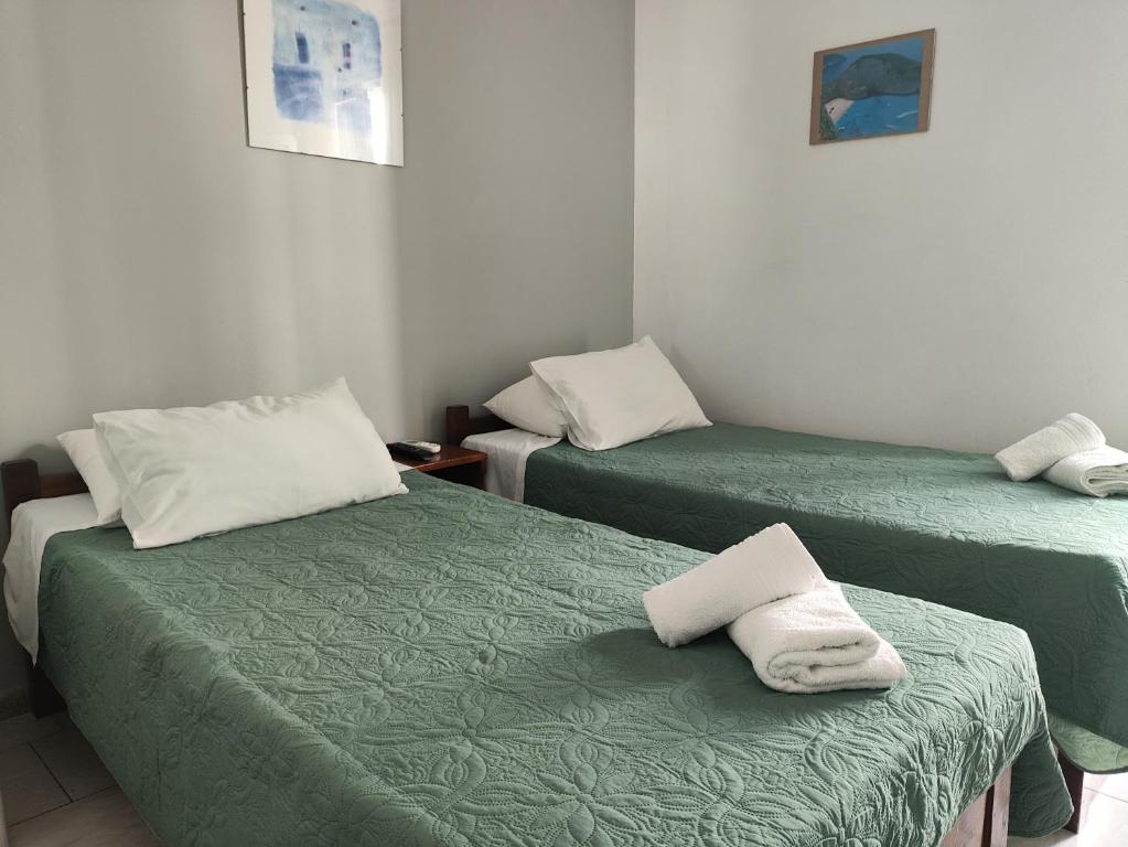 Postel nebo postele na pokoji v ubytování Niki Rooms
