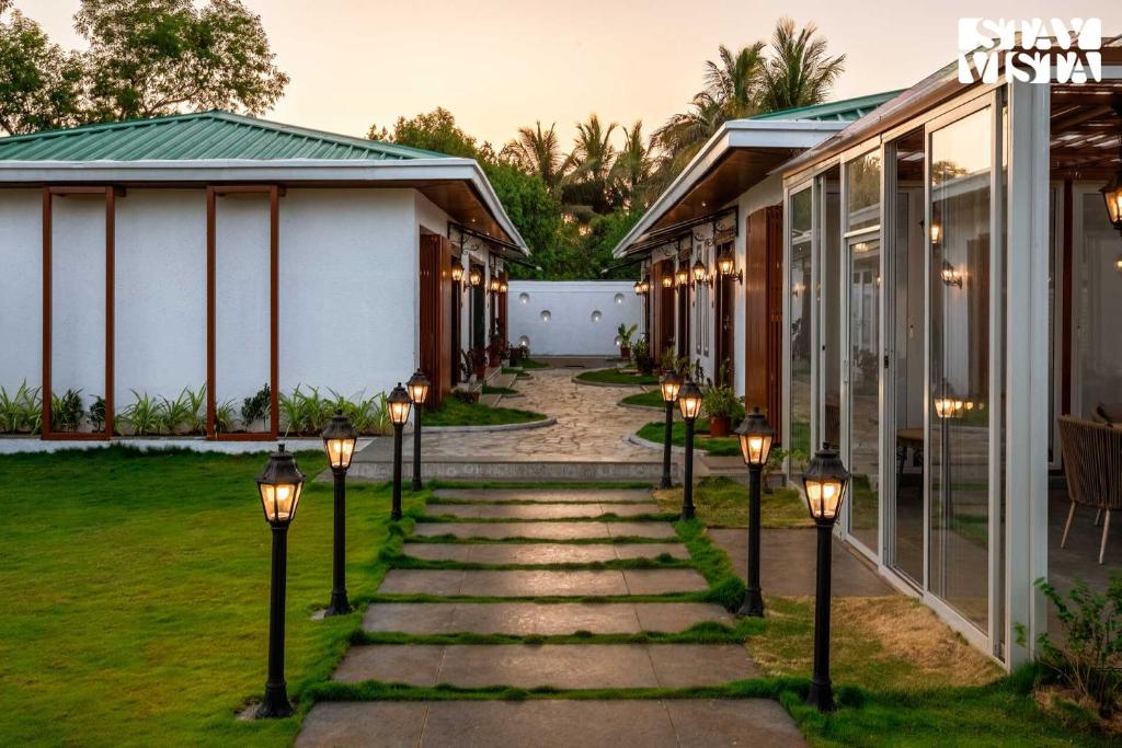 StayVista at The Five Oaks - Private Pool Cottages photo