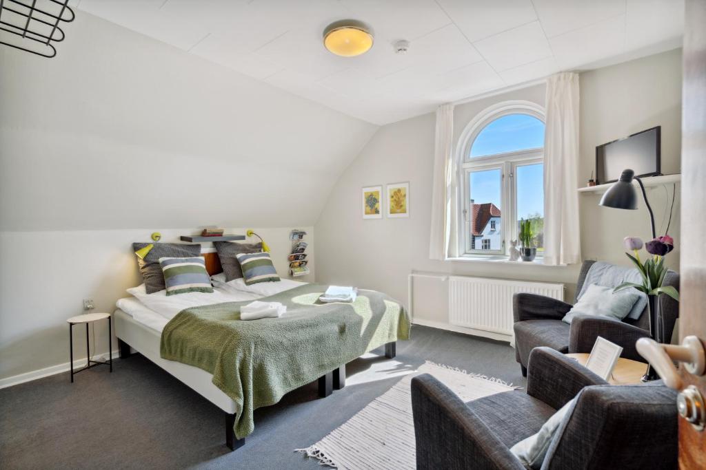 Postel nebo postele na pokoji v ubytování Gredstedbro Hotel