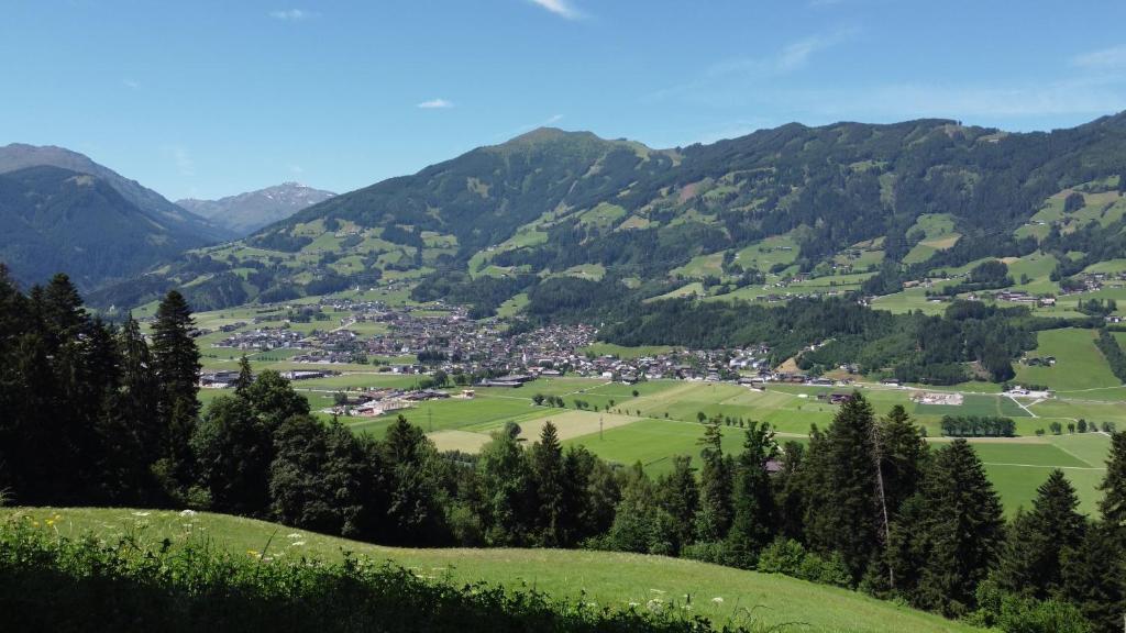 a small town in a valley in the mountains at Perfect Lodgings Panorama in Hart im Zillertal
