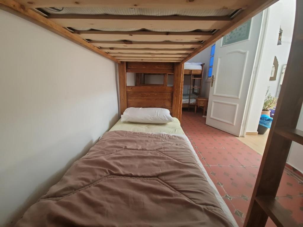 Cama o camas de una habitación en HOSTEL bANANA
