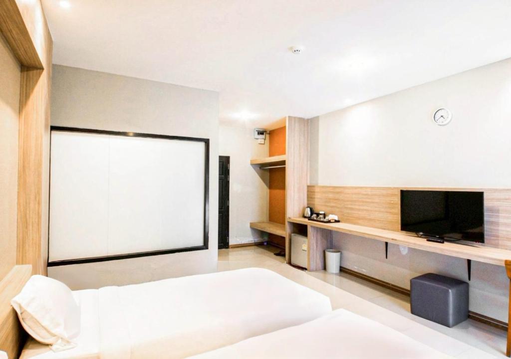 TV a/nebo společenská místnost v ubytování C Hotel Bangna