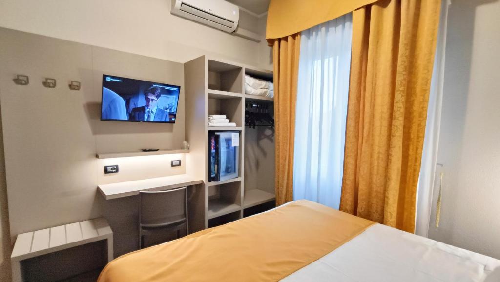 A bed or beds in a room at Valmarina