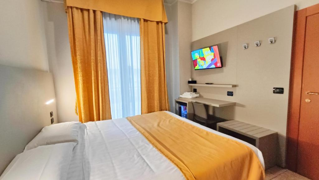 A bed or beds in a room at Valmarina