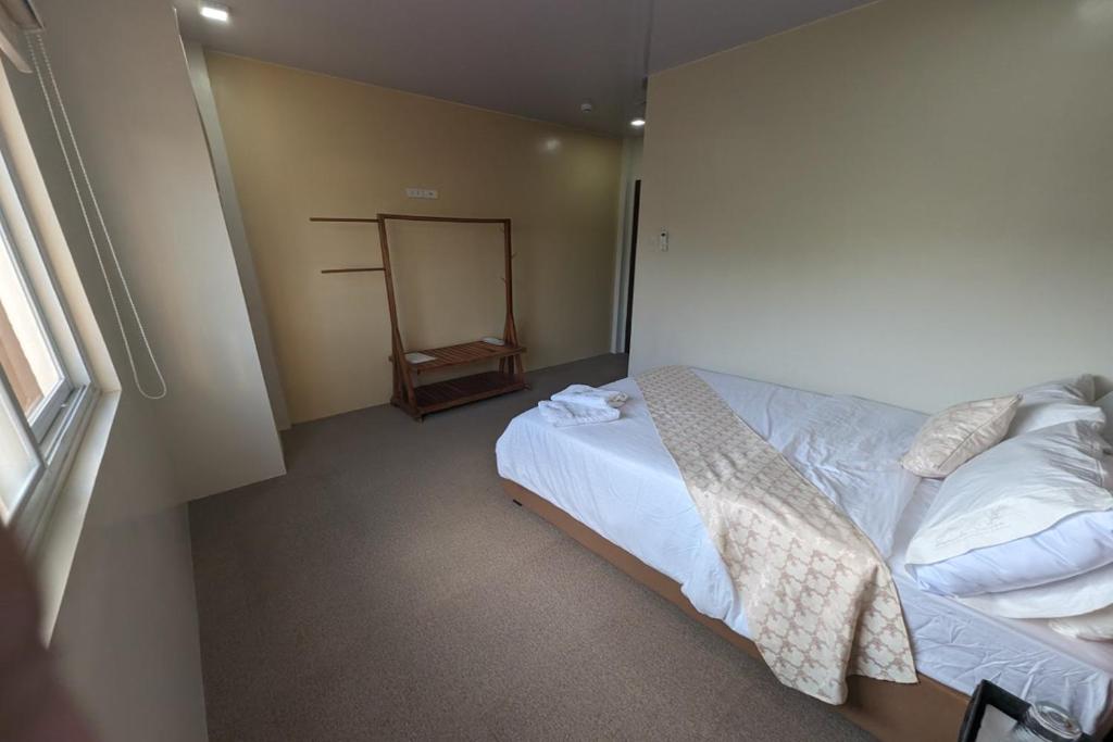 Manuela's Suitesにあるベッド