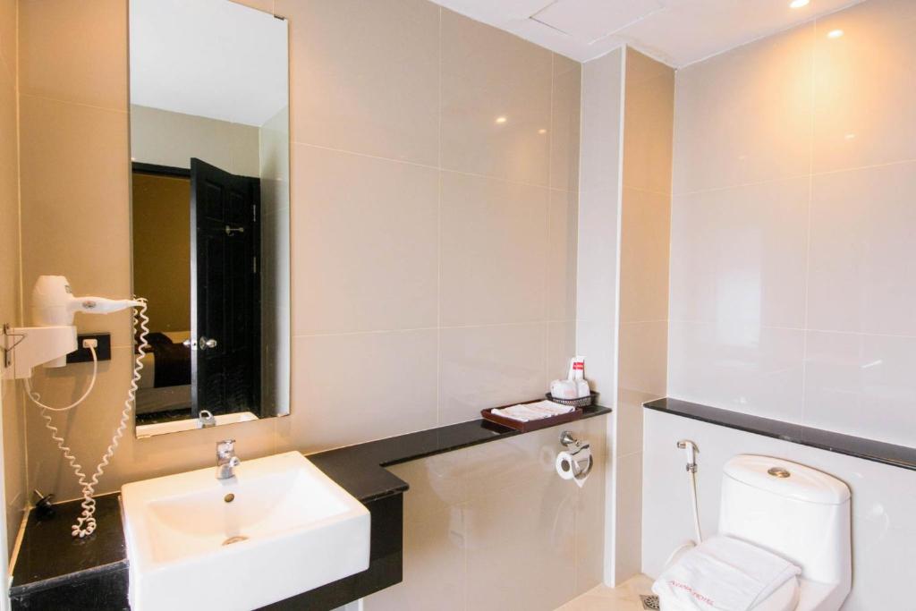 Koupelna v ubytování C Hotel Bangna