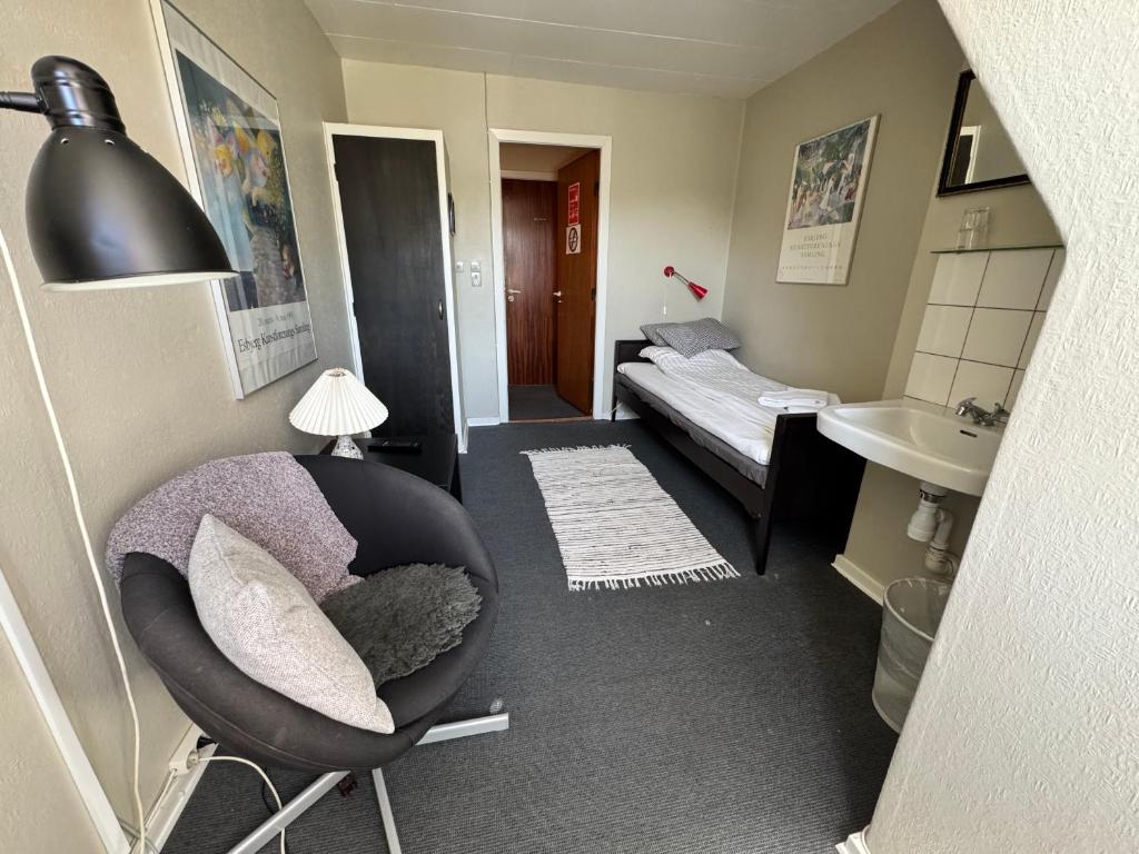Postel nebo postele na pokoji v ubytování Gredstedbro Hotel