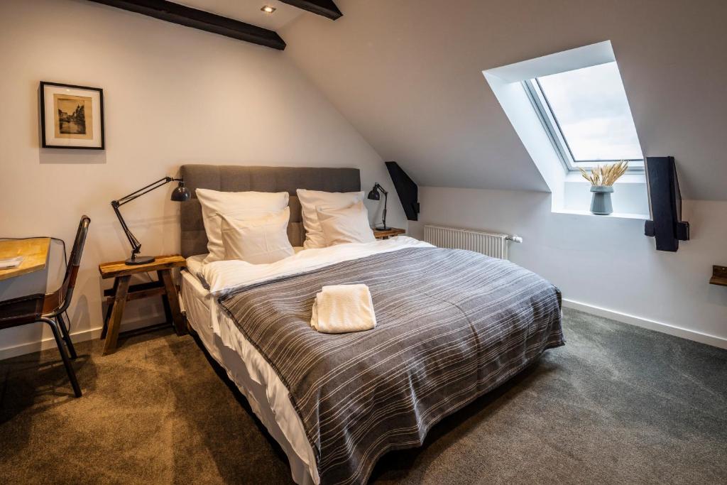 Postel nebo postele na pokoji v ubytování Hotel Birksø