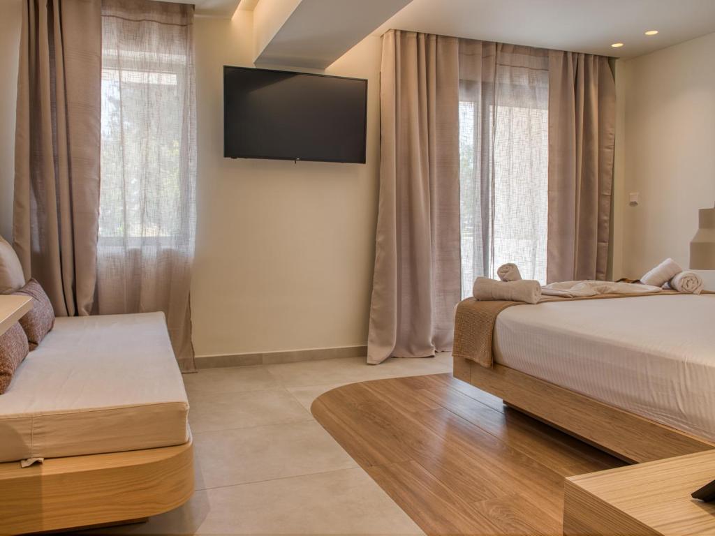 Postel nebo postele na pokoji v ubytování Sandy Seaside Suites