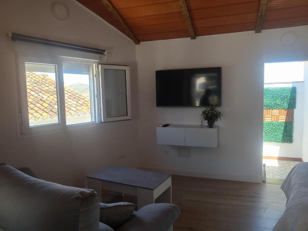 Telewizja i/lub zestaw kina domowego w obiekcie Apartamento Isabel