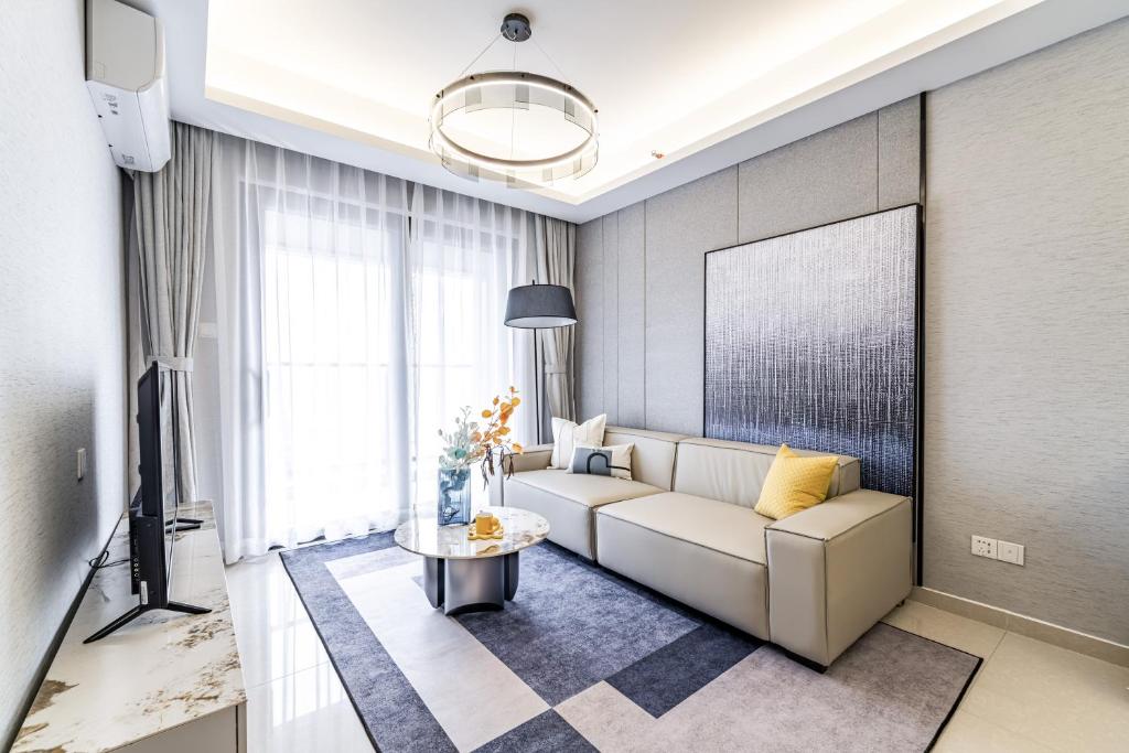 Posezení v ubytování Kingkey Shuibei International Apartment Hotel
