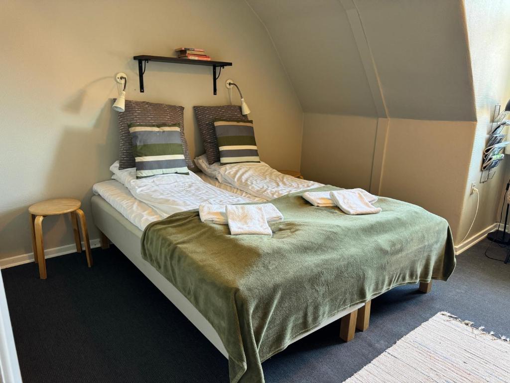 Postel nebo postele na pokoji v ubytování Gredstedbro Hotel