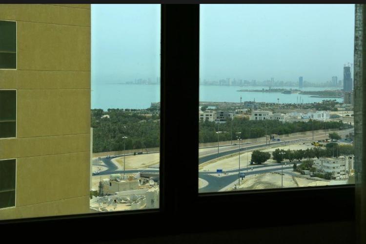 Nespecifikovaný výhled na destinaci Kuvajt nebo výhled na město při pohledu z hotelu