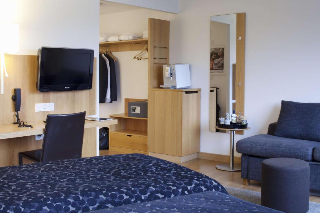 Kuchyň nebo kuchyňský kout v ubytování Scandic Aarhus Vest