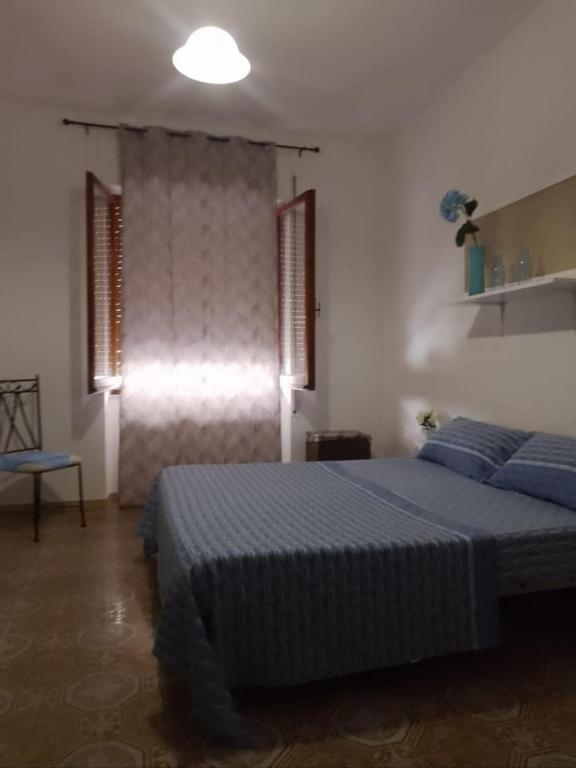 Postel nebo postele na pokoji v ubytování Via F 41