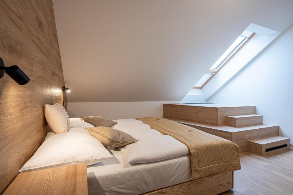 Postel nebo postele na pokoji v ubytování Resort Aurum Residence A