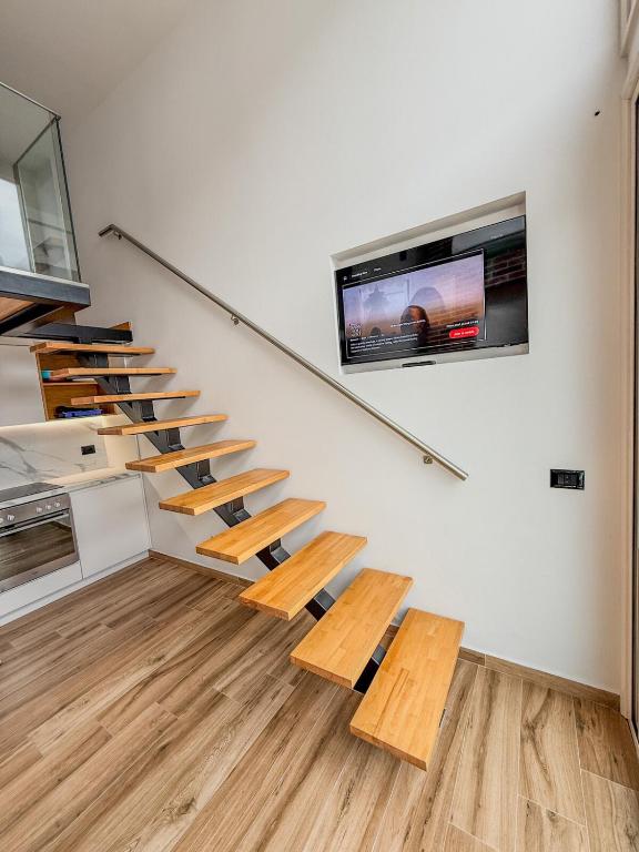 TV a/nebo společenská místnost v ubytování Superior Duplex 1