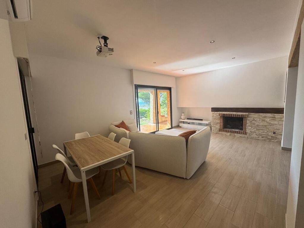 Ένα ή περισσότερα κρεβάτια σε δωμάτιο στο Maison proche des plages