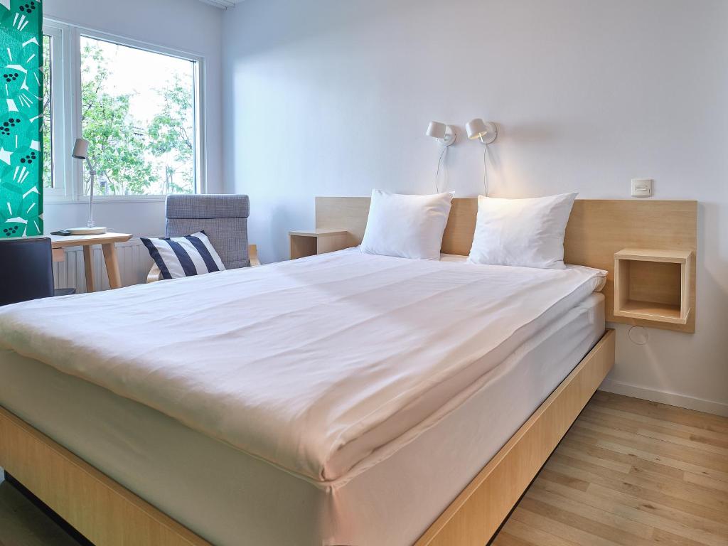 Postel nebo postele na pokoji v ubytování IKEA Hotell