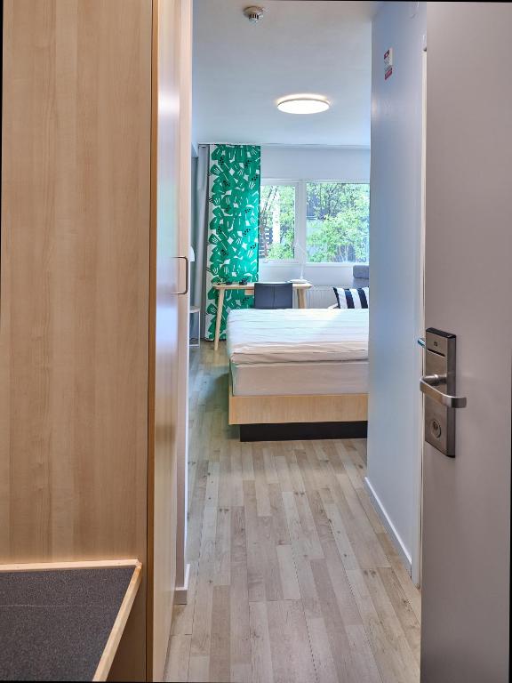 Postel nebo postele na pokoji v ubytování IKEA Hotell