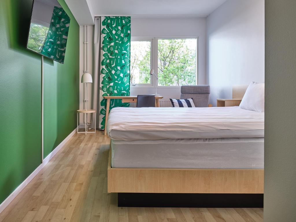 Postel nebo postele na pokoji v ubytování IKEA Hotell