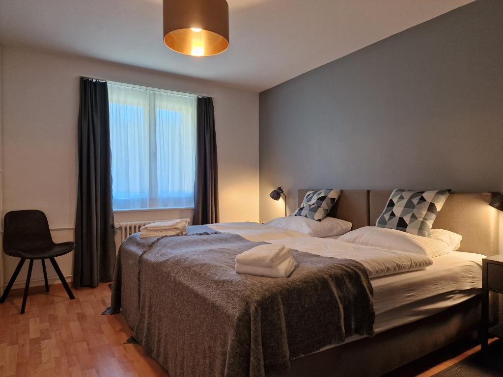 Una cama o camas en una habitación de Apartments Flora - Sunflower