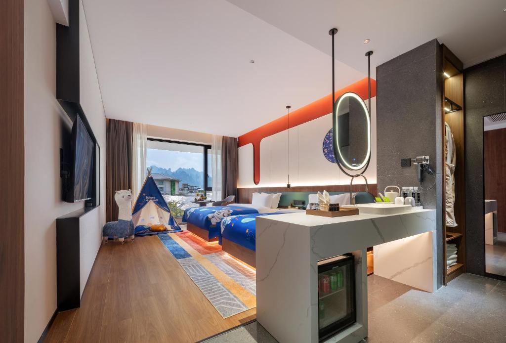 Kuchyň nebo kuchyňský kout v ubytování Zhangjiajie Yujie Hotel