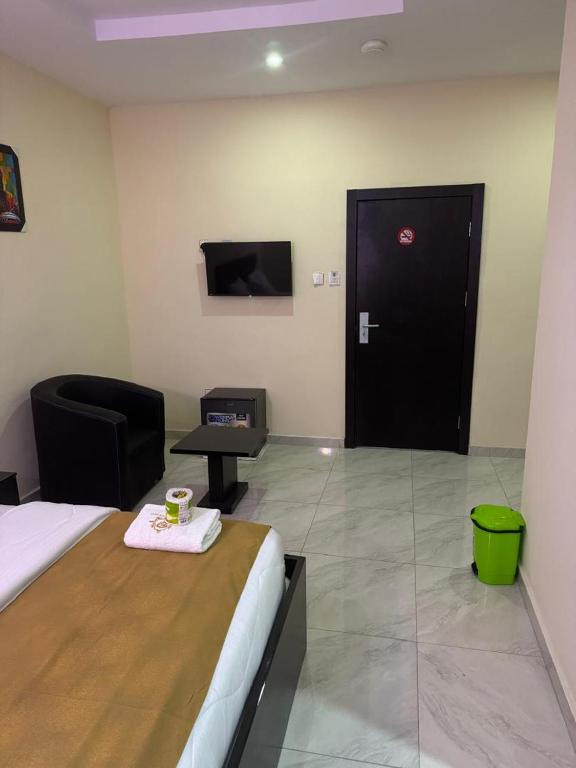 TV a/nebo společenská místnost v ubytování Golden Hits Hotel and Suites