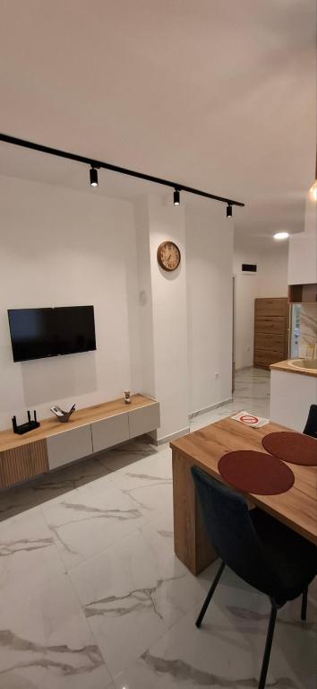 TV a/nebo společenská místnost v ubytování Apartman Marija