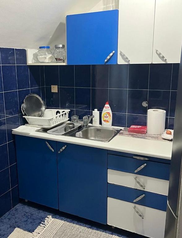 Kuchyň nebo kuchyňský kout v ubytování Apartman 1
