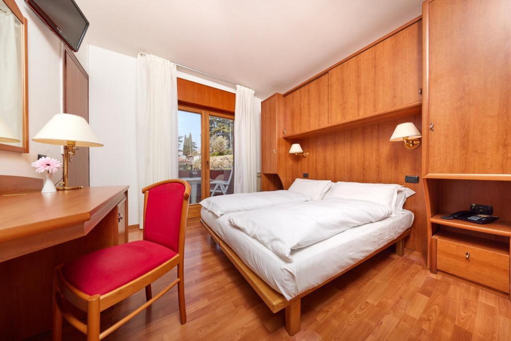 Postel nebo postele na pokoji v ubytování Beach Hotel Rosa