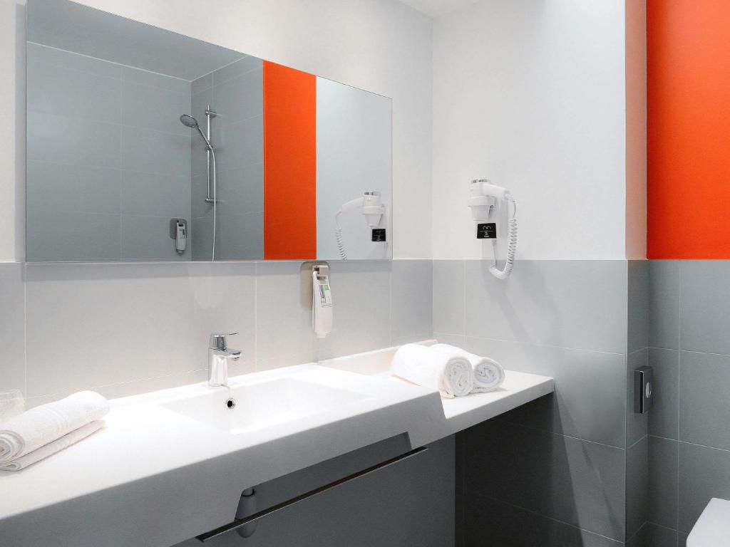 Koupelna v ubytování ibis Styles Caen centre gare