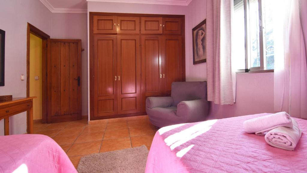 Łóżko lub łóżka w pokoju w obiekcie Villa Nerja Views - by Casitas Select