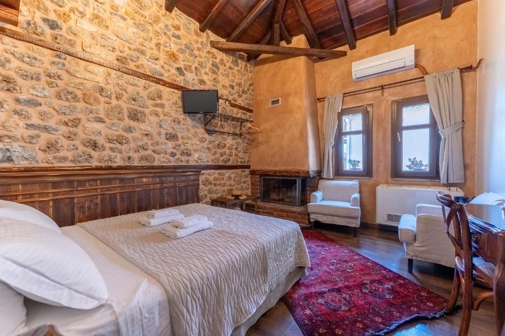 Postel nebo postele na pokoji v ubytování Palio Litochoro The Countryside Lodge