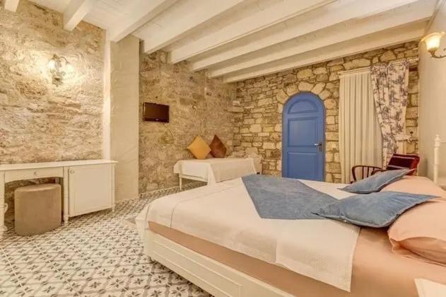 Postel nebo postele na pokoji v ubytování D&E Apartments