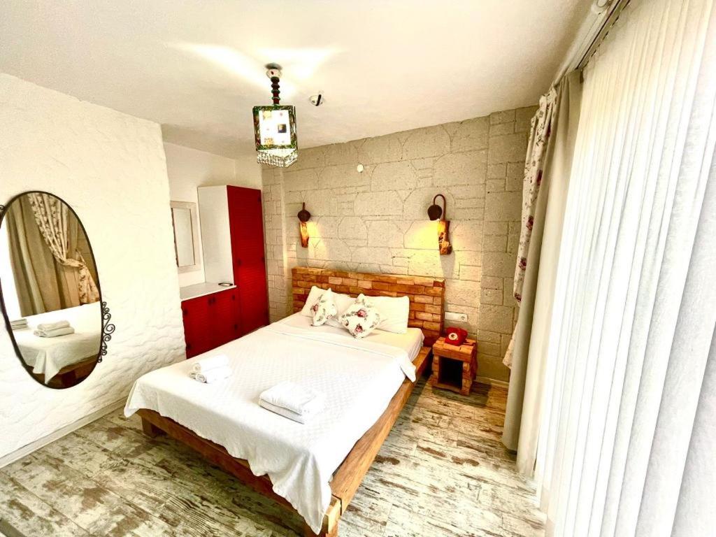 Postel nebo postele na pokoji v ubytování D&E Apartments