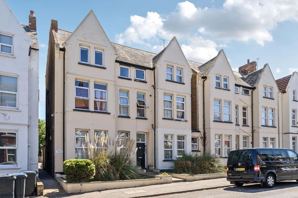 a van parked in front of a row of houses at Number 5 in Margate