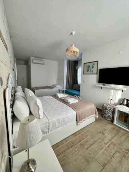 Postel nebo postele na pokoji v ubytování D&E Apartments