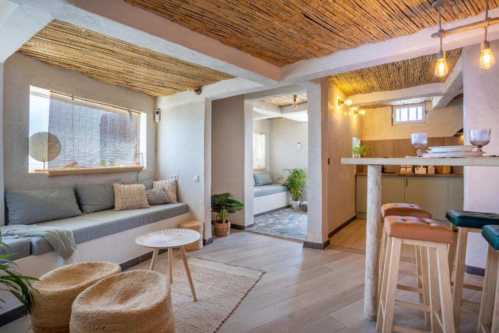 a living room with a couch and a table at Exclusive Home in Güimar