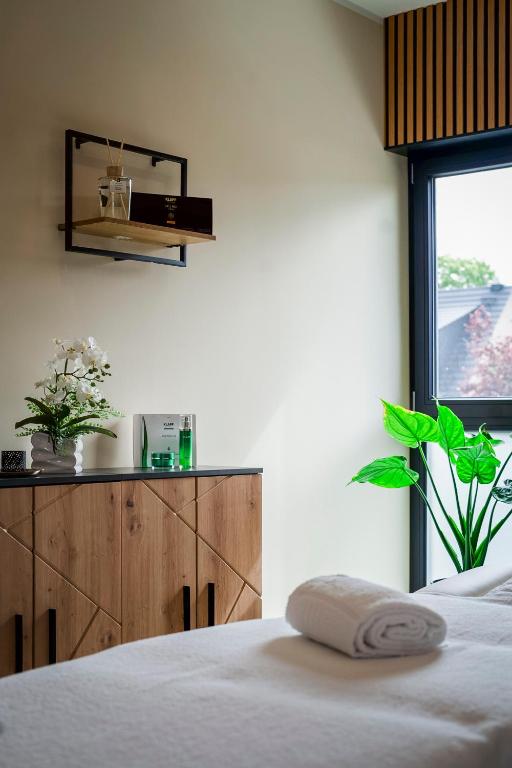 Postel nebo postele na pokoji v ubytování Bernstein Acamed Resort