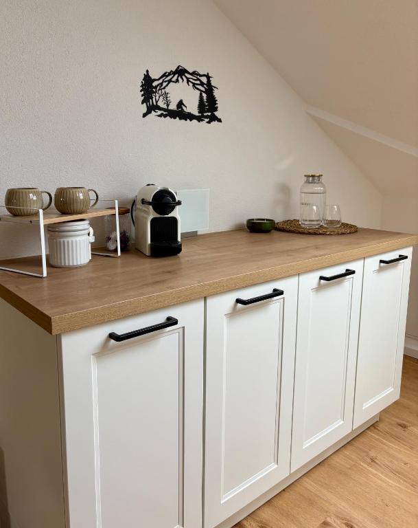 Kuchyň nebo kuchyňský kout v ubytování ALLGÄUHERZ - Ferienwohnung zentral in Nesselwang