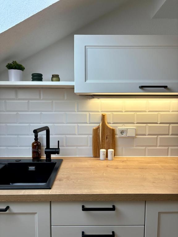 Kuchyň nebo kuchyňský kout v ubytování ALLGÄUHERZ - Ferienwohnung zentral in Nesselwang
