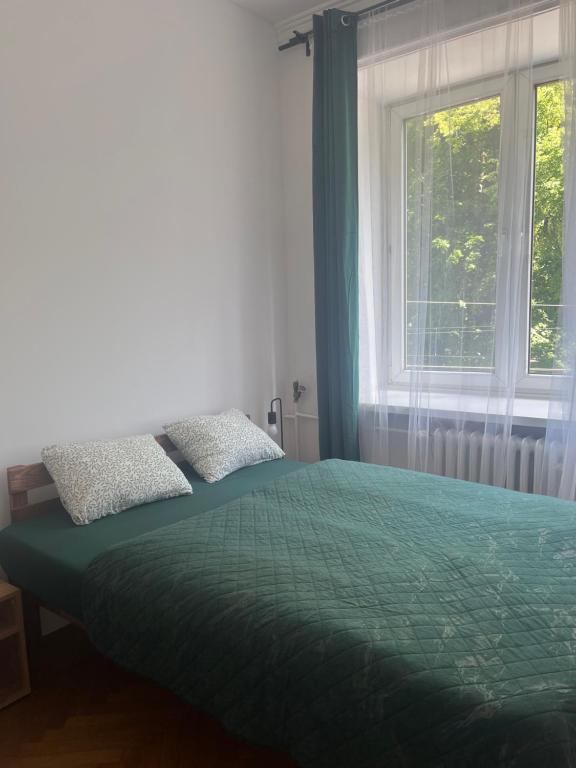 Postel nebo postele na pokoji v ubytování Tom Hostel